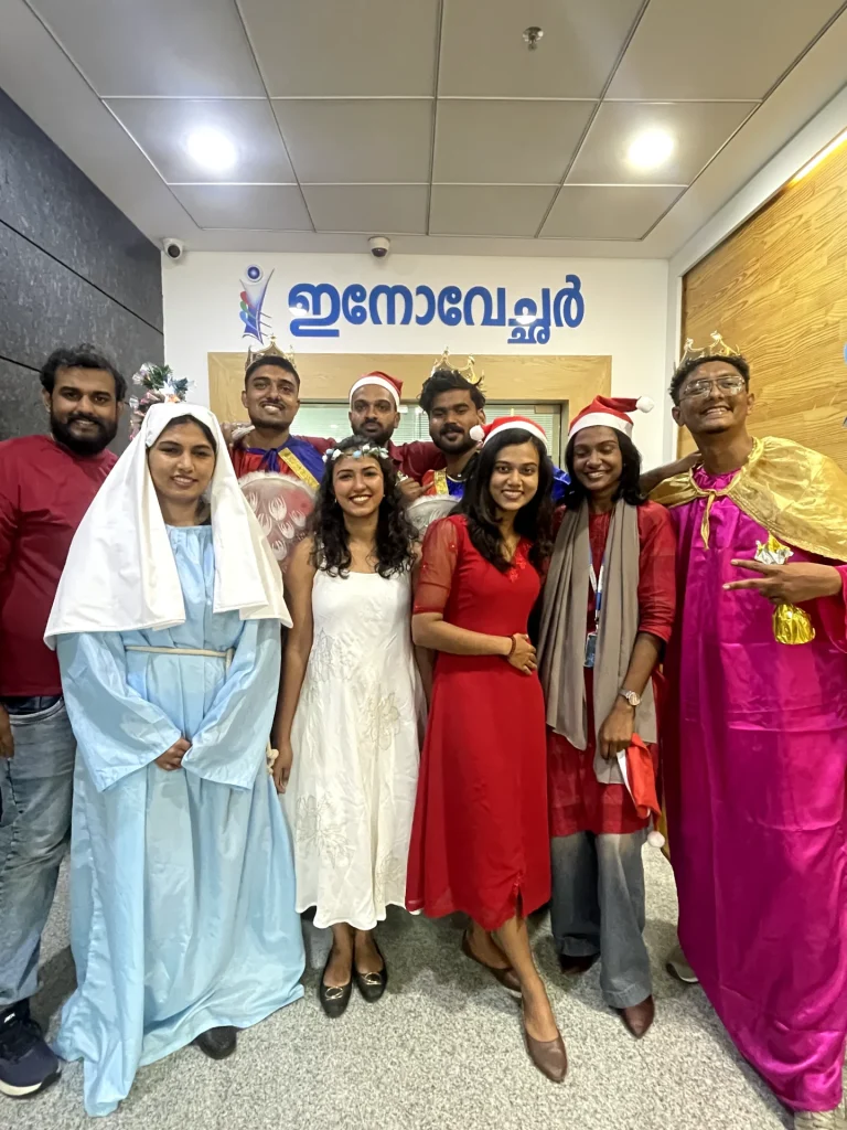 Innovators posing for a photo for christmas